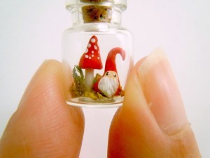micro Christmas elf and mushroom in a bottle - tiny terrarium vial