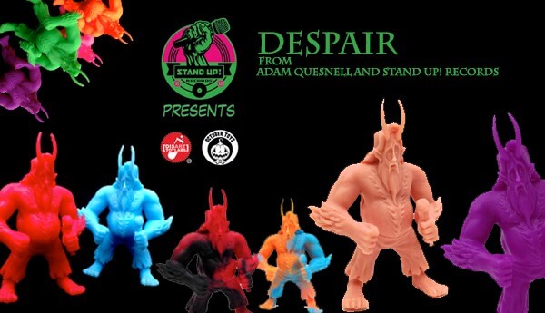 The-Despair-rubber-mini-figure-from-Adam-Quesnell-and-Stand-Up-Records-TTC-banner