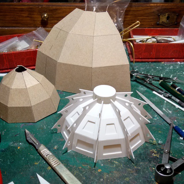 "Figuring our a geodesic dome for the train carriage reactor. There are probably some computer programmes that could do this and then I could have had acrylic sheet laser cut and just stuck the pieces together. But I went old school. Worked it out with cereal box card and then cut each piece by hand"