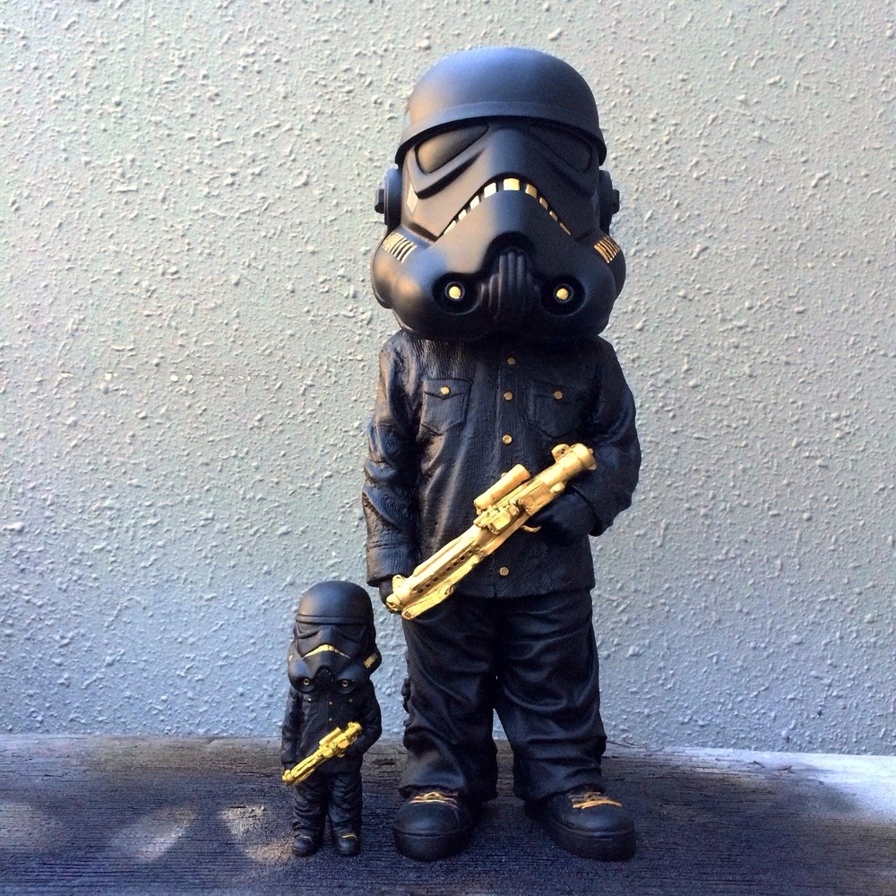 Mini Trooper Boy - Black and Gold  by FLABSLAB and ImagineNation DesignStudios