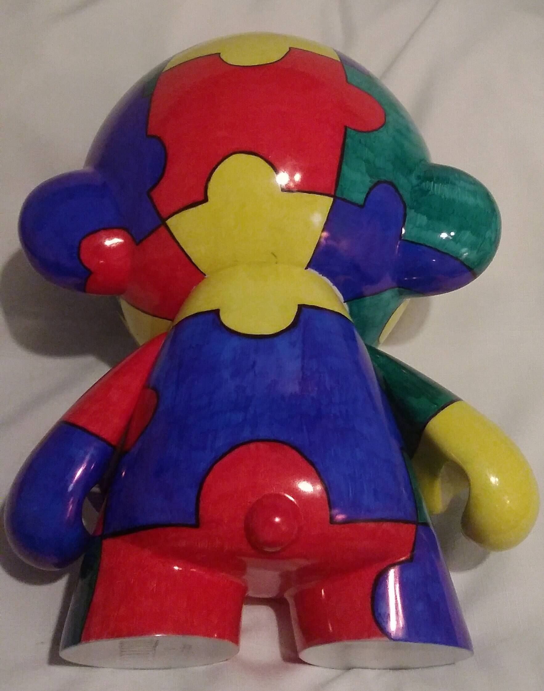 mega-awareness-munny-rear